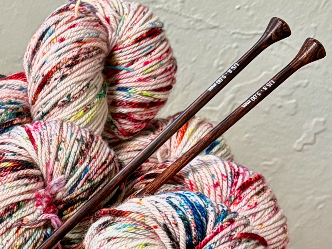 knitting needles in yarn