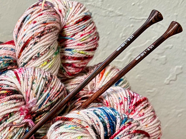 knitting needles in yarn